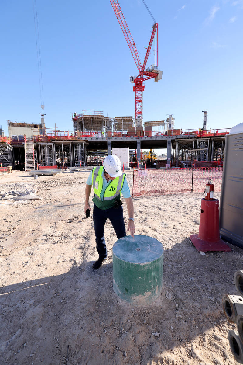 An Athletics green concrete cylinder marks home plate as construction continues on the A&#x2019 ...