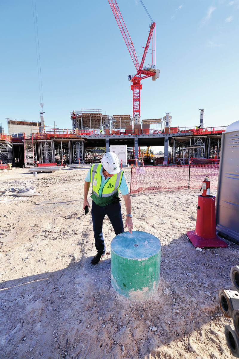 An Athletics green concrete cylinder marks home plate as construction continues on the A&#x2019 ...