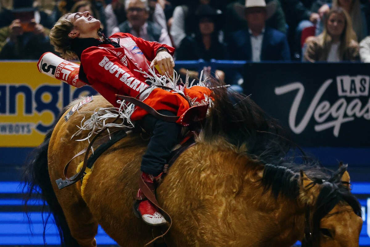 Rocker Shane Steiner competes in the bareback riding event during the seventh go-round of the N ...