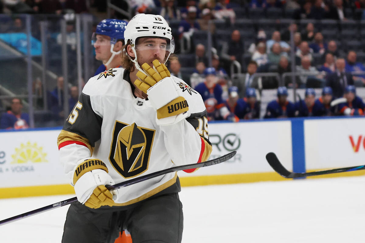 Vegas Golden Knights' Noah Hanifin (15) gestures after scoring against the New York Island ...