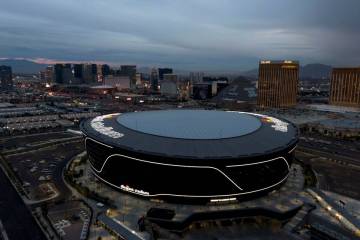 Aerial view of Allegiant Stadium and the Las Vegas Strip on Tuesday, December 7, 2021. (Las Veg ...