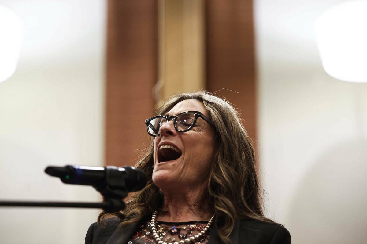 Shabbatones lead singer Glori Rosenberger performers during a ceremony to formally install Rabb ...