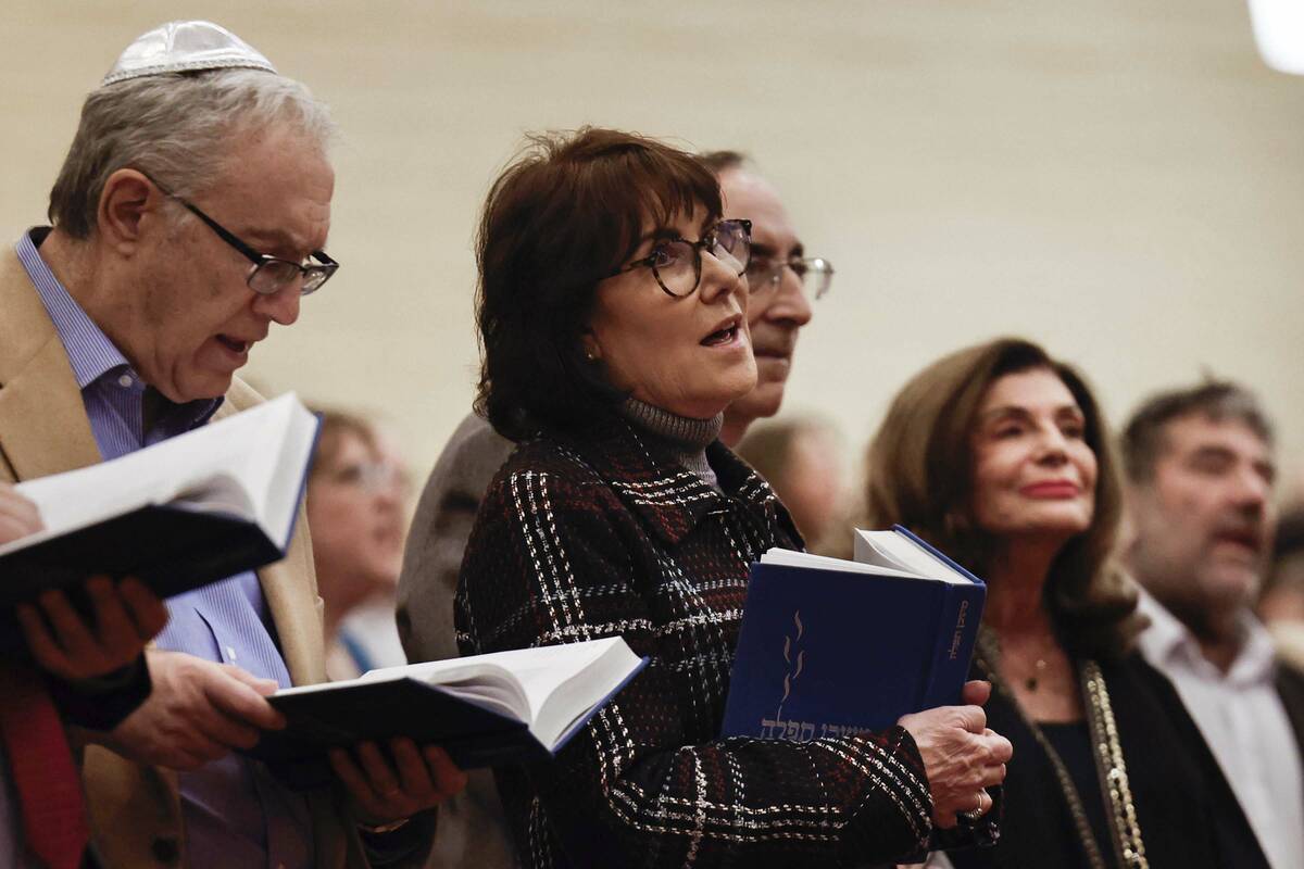 U.S. Sen. Jacky Rosen, middle, sings during the installation ceremony of Rabbi-Cantor Jessica H ...
