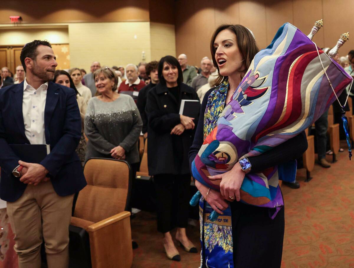 Rabbi-Cantor Jessica Hutchings sings during the start of a ceremony to formally install her as ...