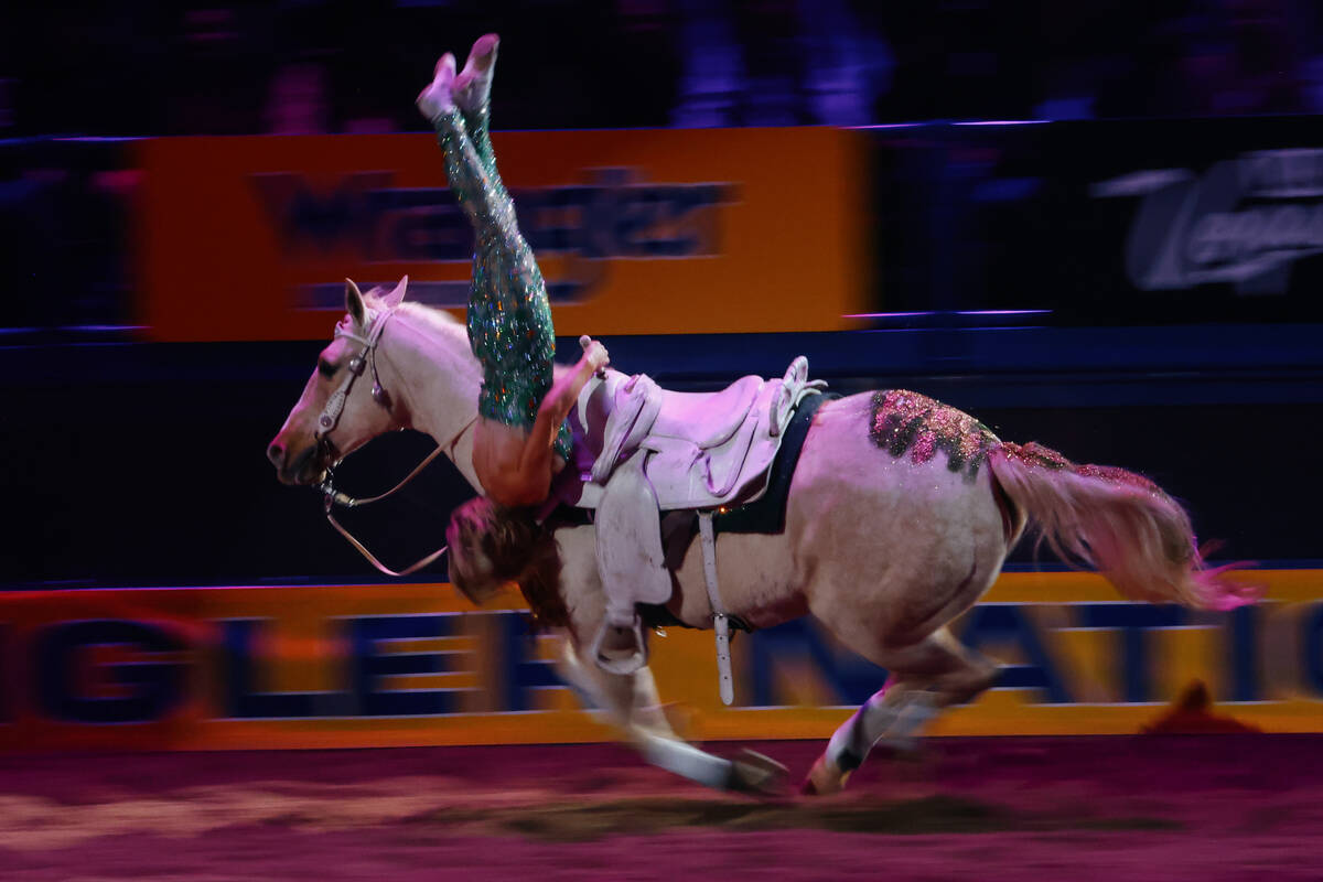 Trick rider Bethany Kiesner performs between events during the seventh go-round of the National ...