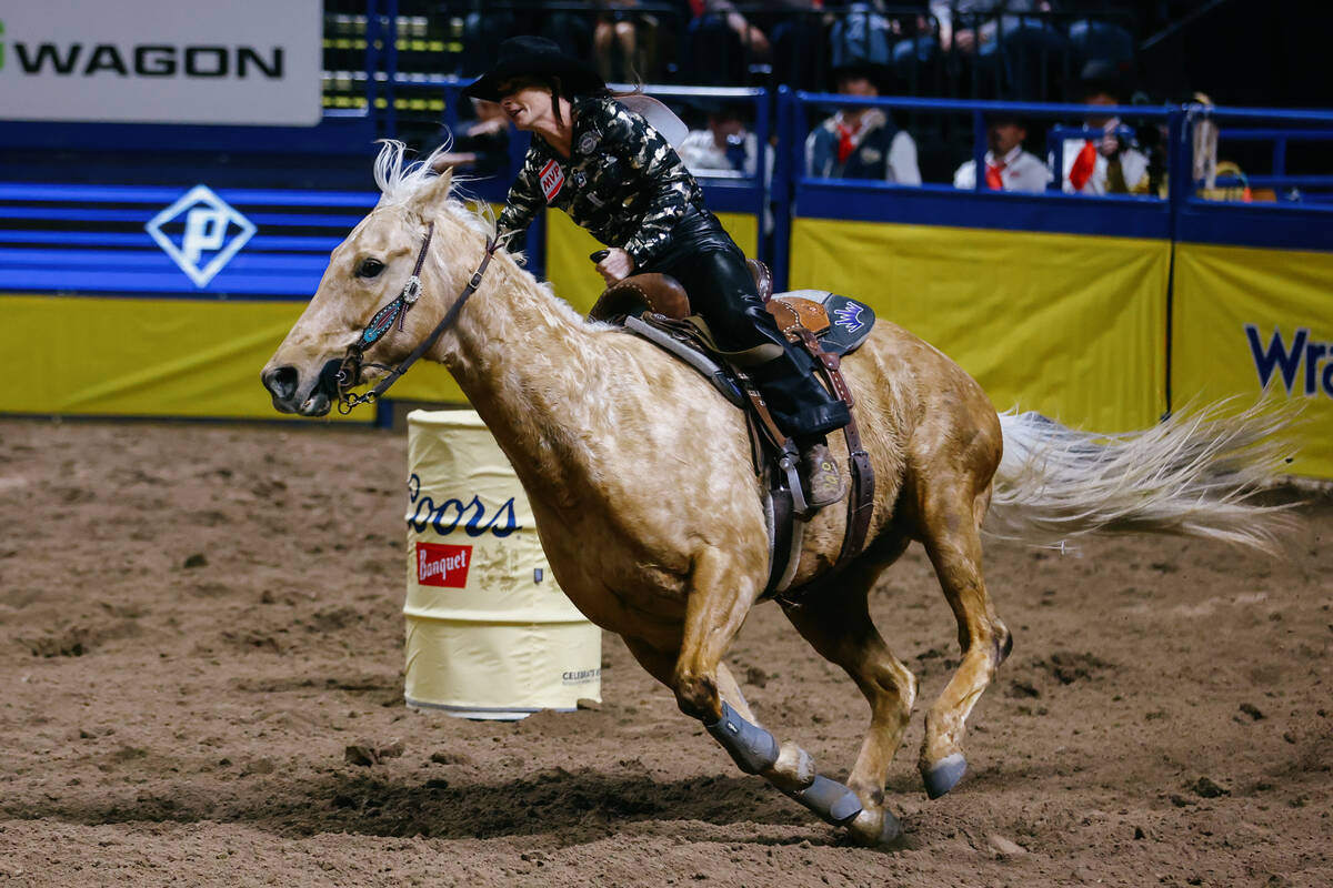 Hayle Gibson-Stillwell competes in the barrel racing event during the seventh go-round of the N ...
