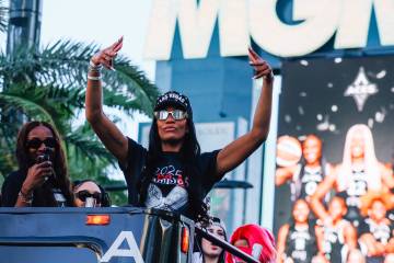 Aces center A'ja Wilson during the Aces’ championship parade on the Strip Friday, O ...