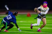 Sierra Vista quarterback Amaya Wusstig (11) scrambles during a flag football game between Sierr ...