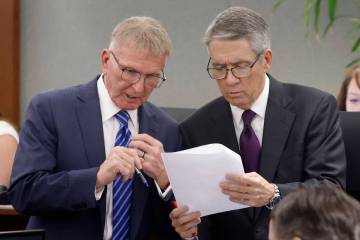 Attorneys Robert Eglet, left, and Dan Polsenberg review legal documents at the Regional Justice ...