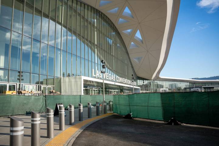 Temporary green fences block areas under construction from public view at the Las Vegas Convent ...