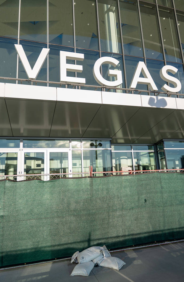 Temporary green fences block areas under construction from public view at the Las Vegas Convent ...