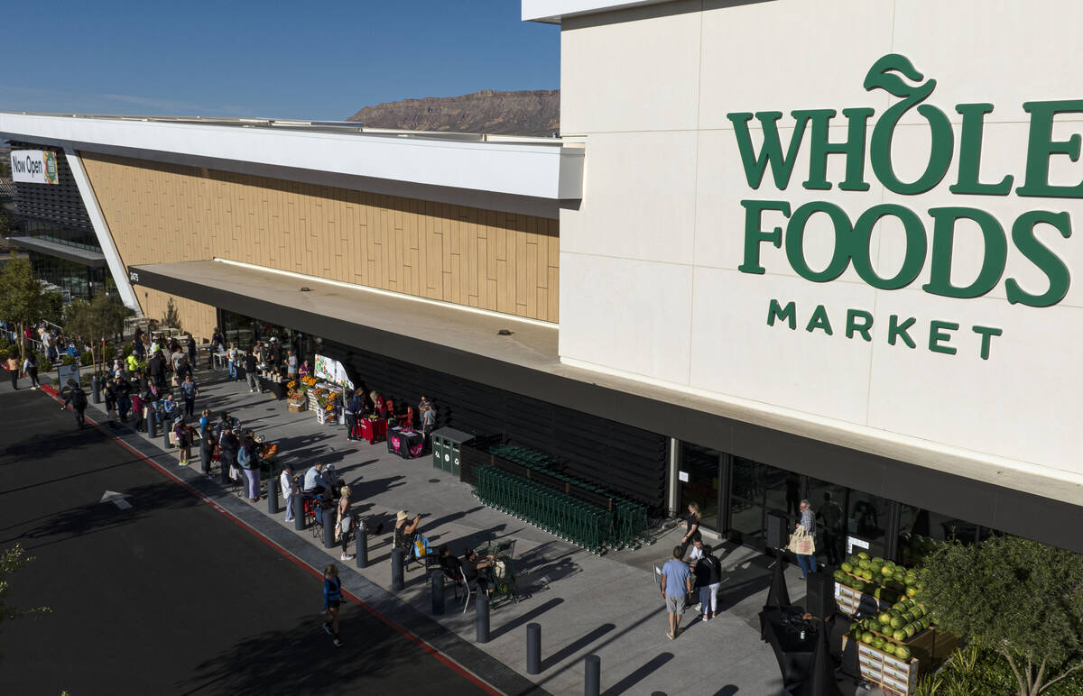 Shoppers line up as they wait for the grand opening of Summerlin Whole Foods on Thursday, May 1 ...