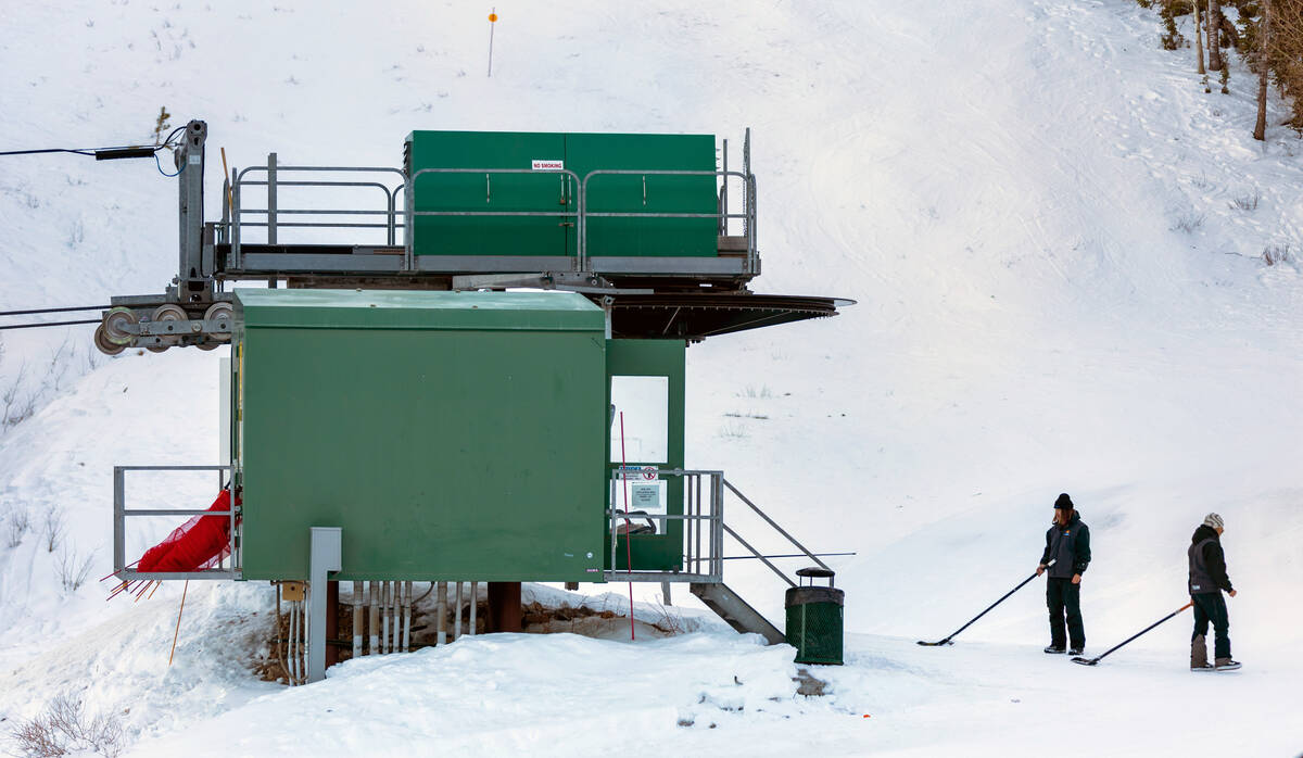 Lift workers ready the area for skiers at Lee Canyon on Wednesday, Dec. 10, 2025, outside of La ...