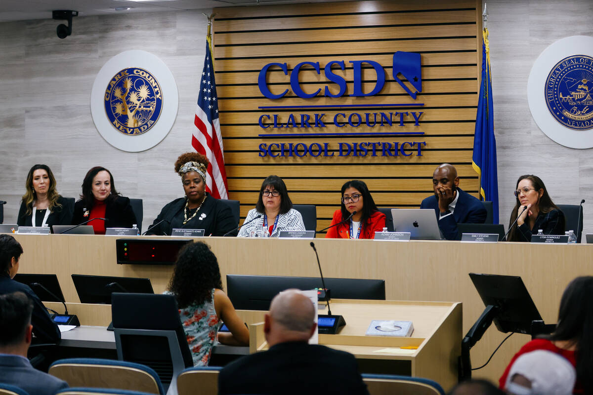 Trustees listen to student presenters during the last Clark County School Board meeting of the ...