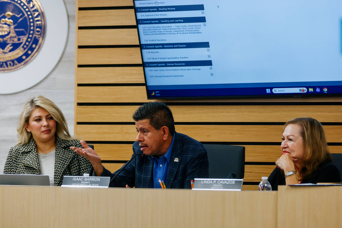 Trustee Isaac Barron, representing the City of North Las Vegas, center, speaks during the last ...