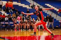 Mater East guard Myla Faught chases the ball during a basketball game between Mater East and Co ...