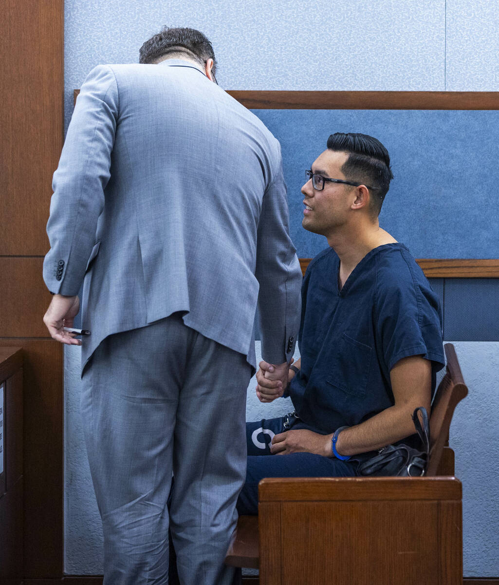 Philippe Dinh, a Las Vegas police officer facing kidnapping and domestic violence charges, gree ...