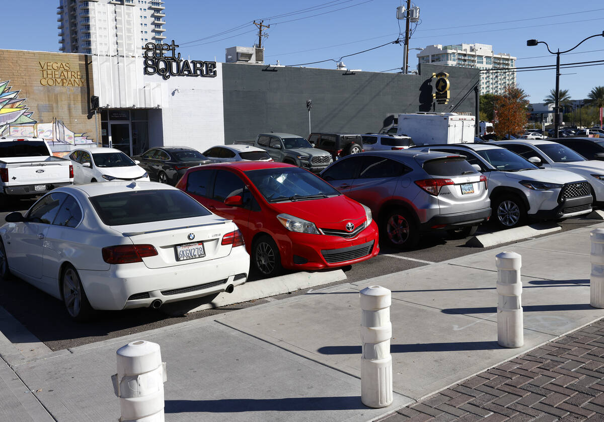 Cars are parked at 107 East Charleston Blvd. parking lot on Friday, Dec. 12, 2025, in Las Vegas ...