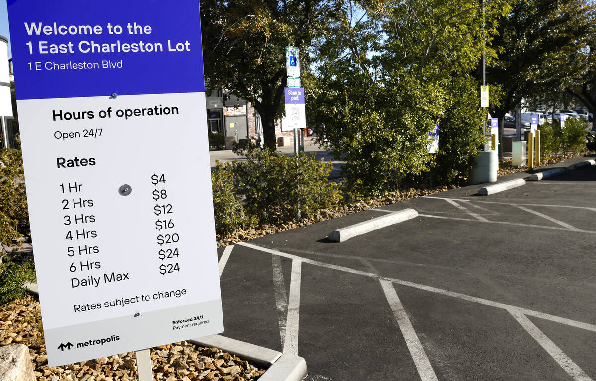 Parking fees are posted at 1 East Charleston Blvd. parking lot on Friday, Dec. 12, 2025, in Las ...