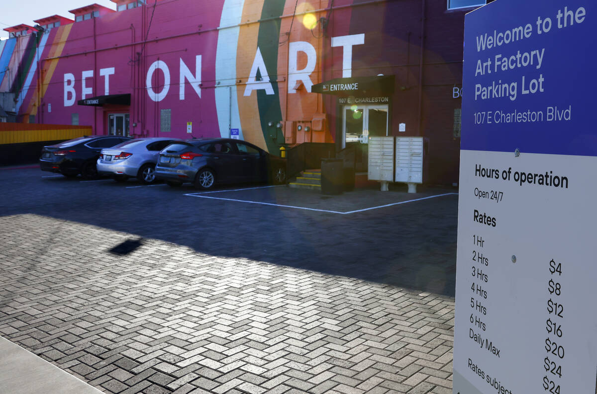 Parking fees are posted at 107 East Charleston Blvd. parking lot on Friday, Dec. 12, 2025, in L ...