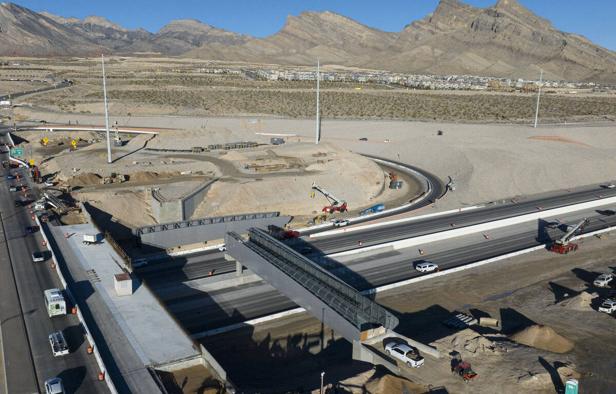 Construction on a pedestrian bridge is underway on the 215 Beltway and Summerlin Parkway interc ...
