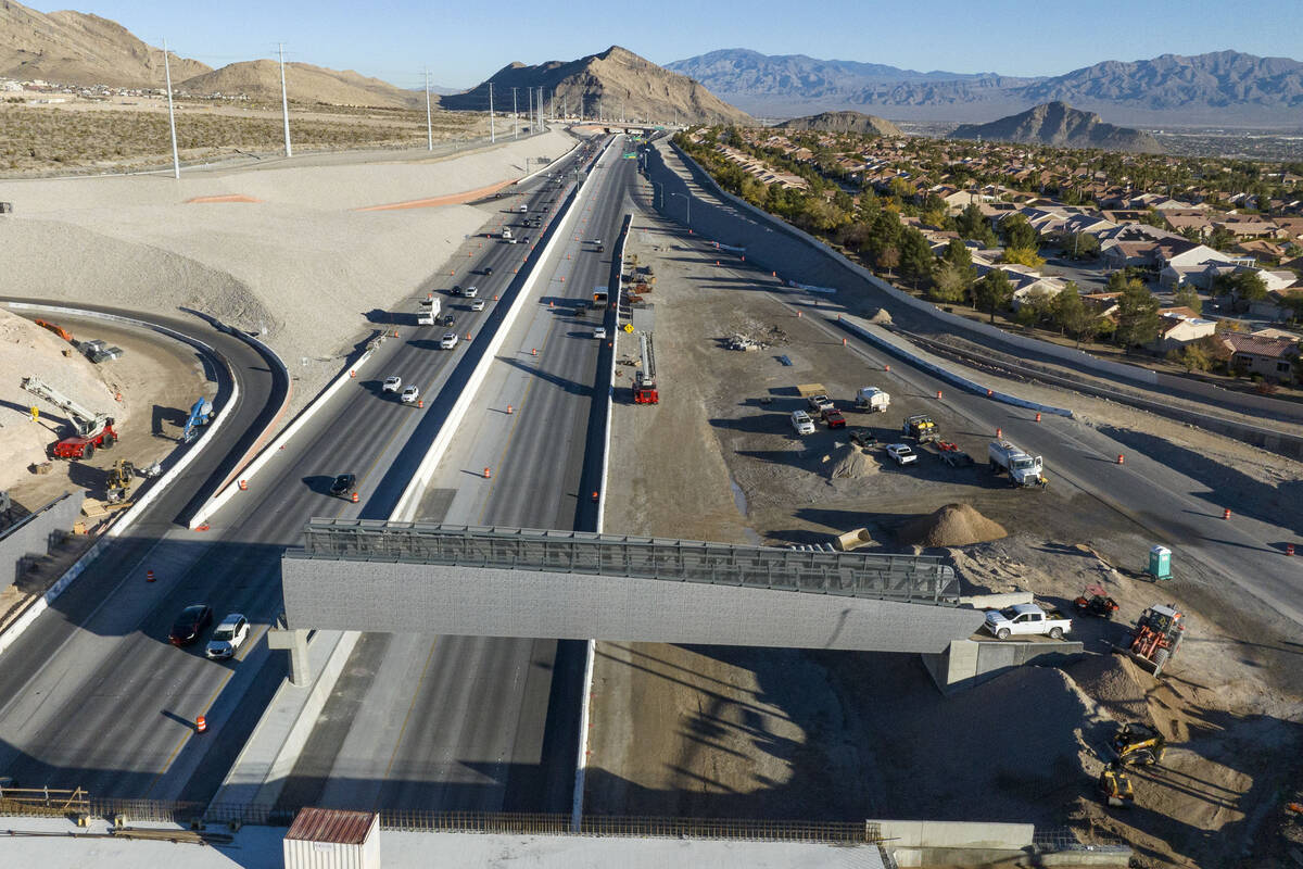 Construction on a pedestrian bridge is underway on the 215 Beltway and Summerlin Parkway interc ...