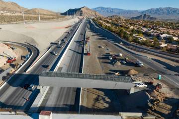 Construction on a pedestrian bridge is underway on the 215 Beltway and Summerlin Parkway interc ...
