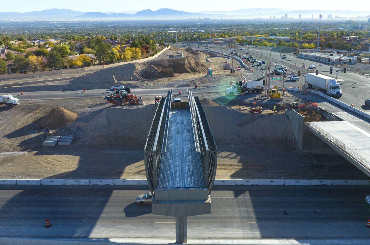 Construction on a pedestrian bridge is underway on the 215 Beltway and Summerlin Parkway interc ...