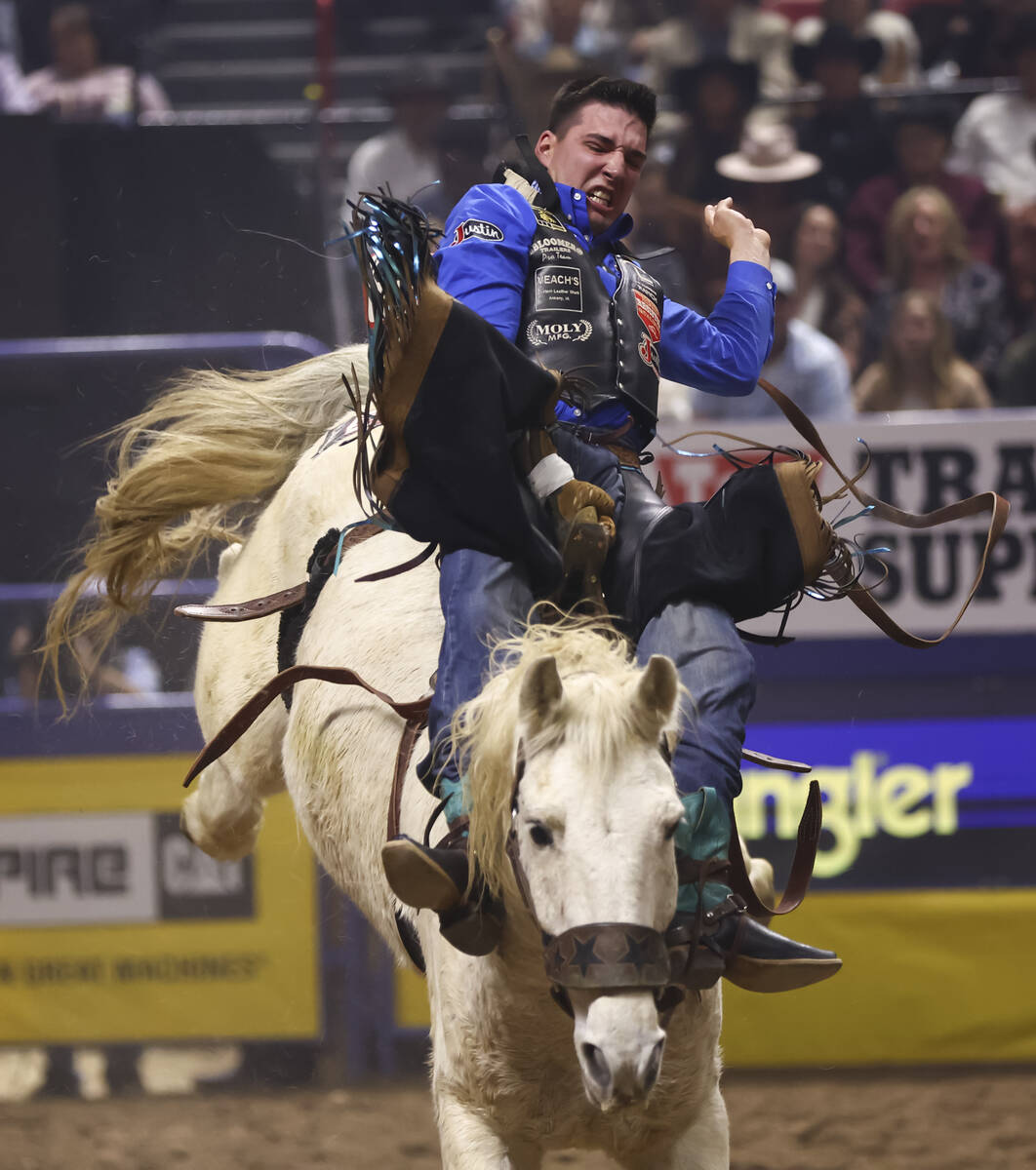 Jess Pope rides Deep Springs while competing in bareback riding during the eighth go-round of t ...