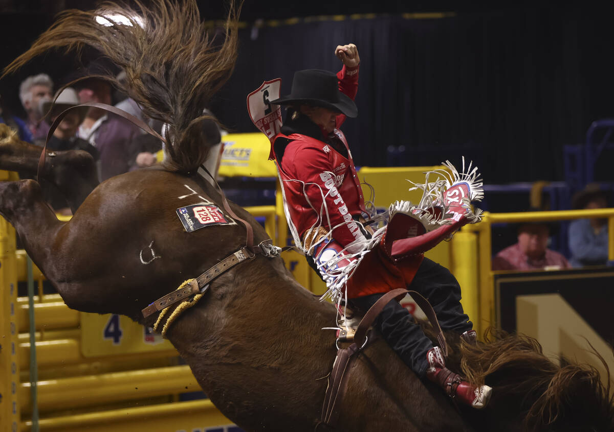 Rocker Steiner rides Queezy Roller while competing in bareback riding during the eighth go-roun ...