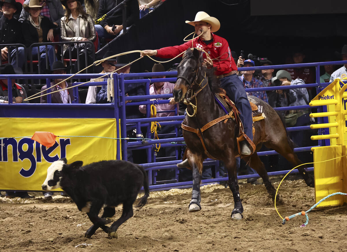 Kincade Henry competes in tie-down roping during the eighth go-round of the National Finals Rod ...