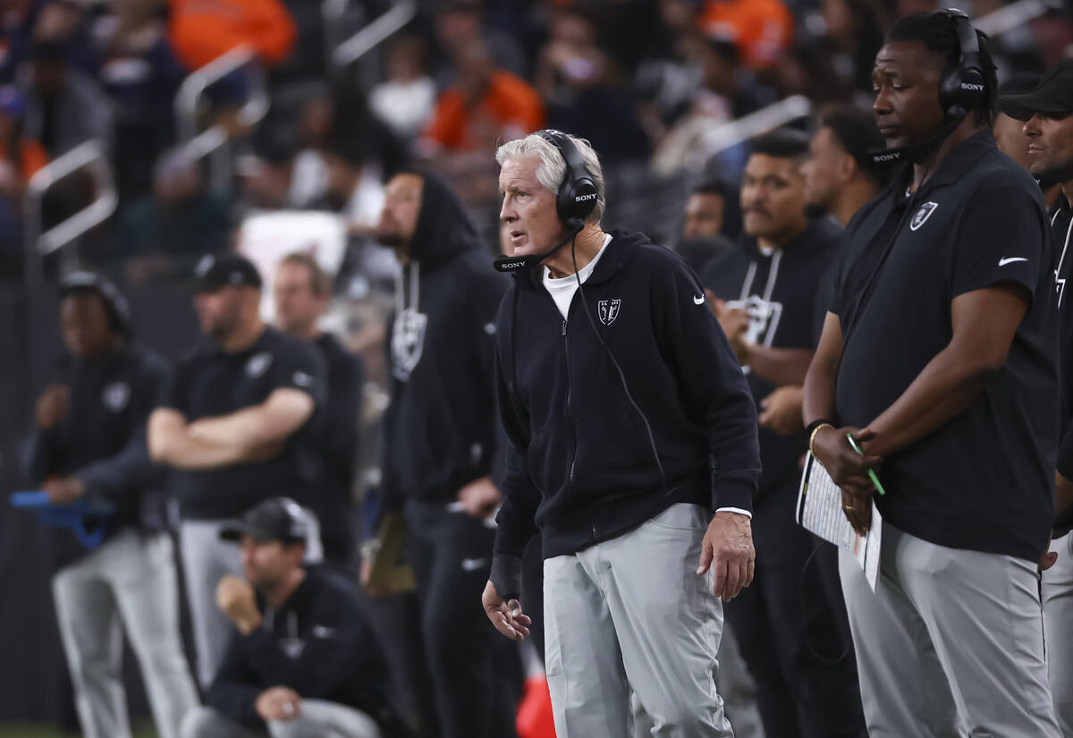 Raiders head coach Pete Carroll looks on during the second half of an NFL game against the Denv ...
