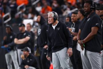 Raiders head coach Pete Carroll looks on during the second half of an NFL game against the Denv ...