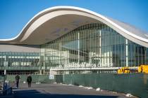 Temporary green fences block areas under construction from public view at the Las Vegas Convent ...