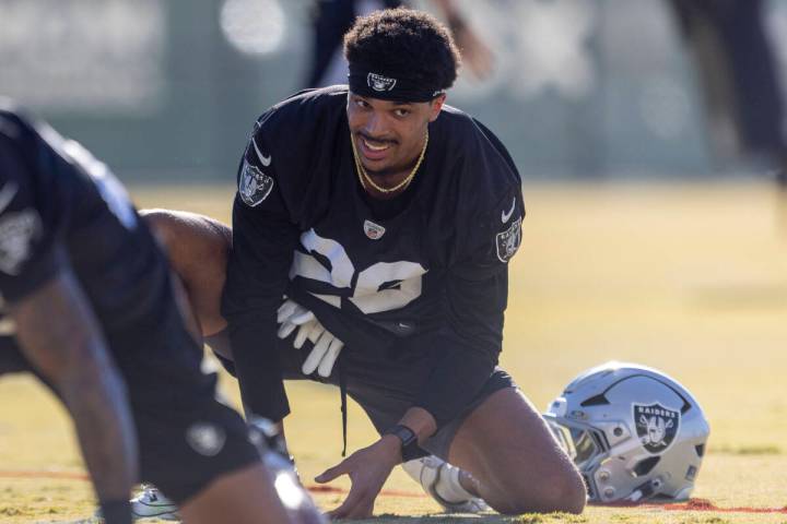 Raiders cornerback Darien Porter (26) stretches during the team’s practice at the Intermounta ...