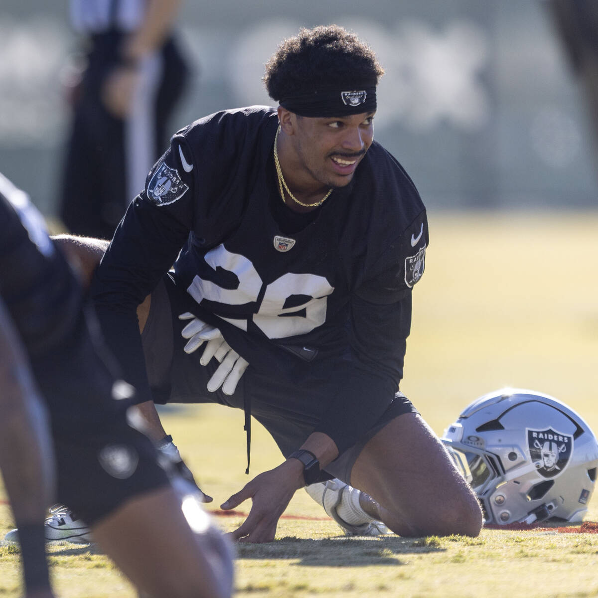 Raiders cornerback Darien Porter (26) stretches during the team’s practice at the Interm ...