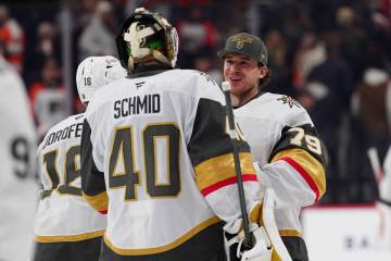Vegas Golden Knights goaltender Akira Schmid (40) celebrates a victory with goaltender Carter H ...