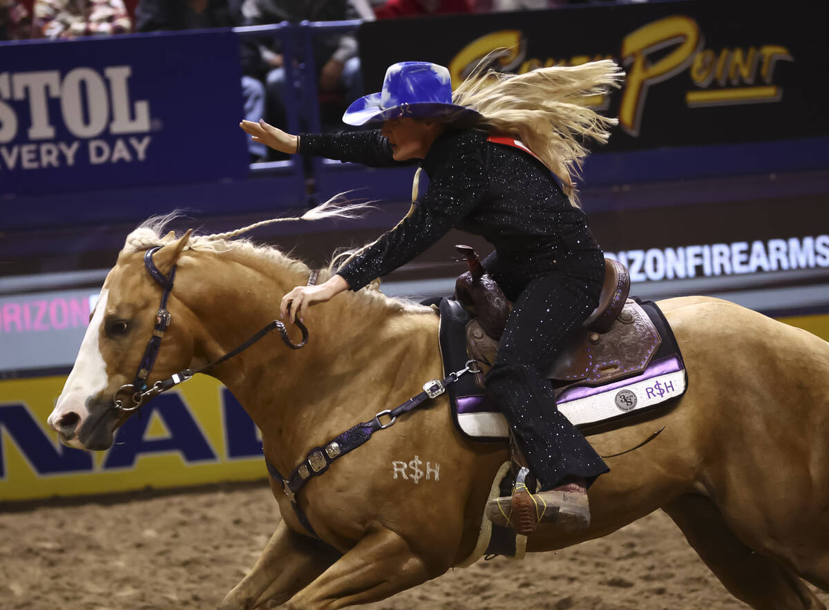 Tricia Aldridge competes in barrel racing during the fifth go-round of the National Finals Rode ...