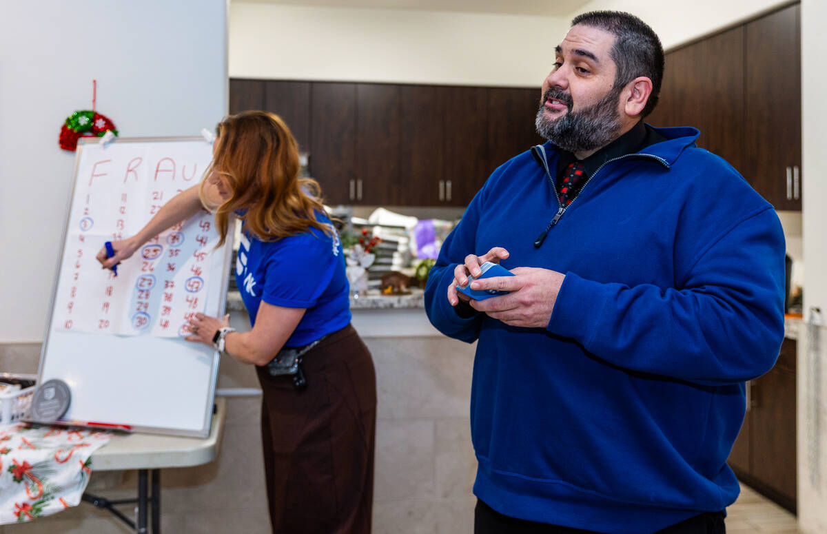 Matthew Perdroza with GBank calls out the next letter and number as the bank teams with the Ind ...