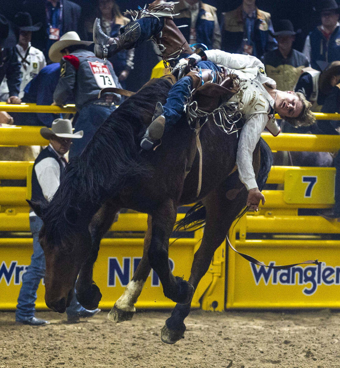 Cooper Cooke rides No Whiskey's Redlicious Meats to a win in Bareback Riding during the 9t ...