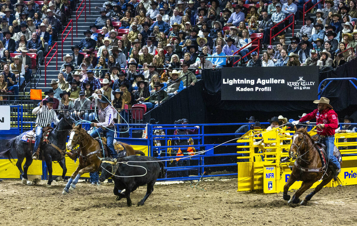 Header Kaden Profili and Heeler Lightning Aguilera team up on their calf for a winning time dur ...