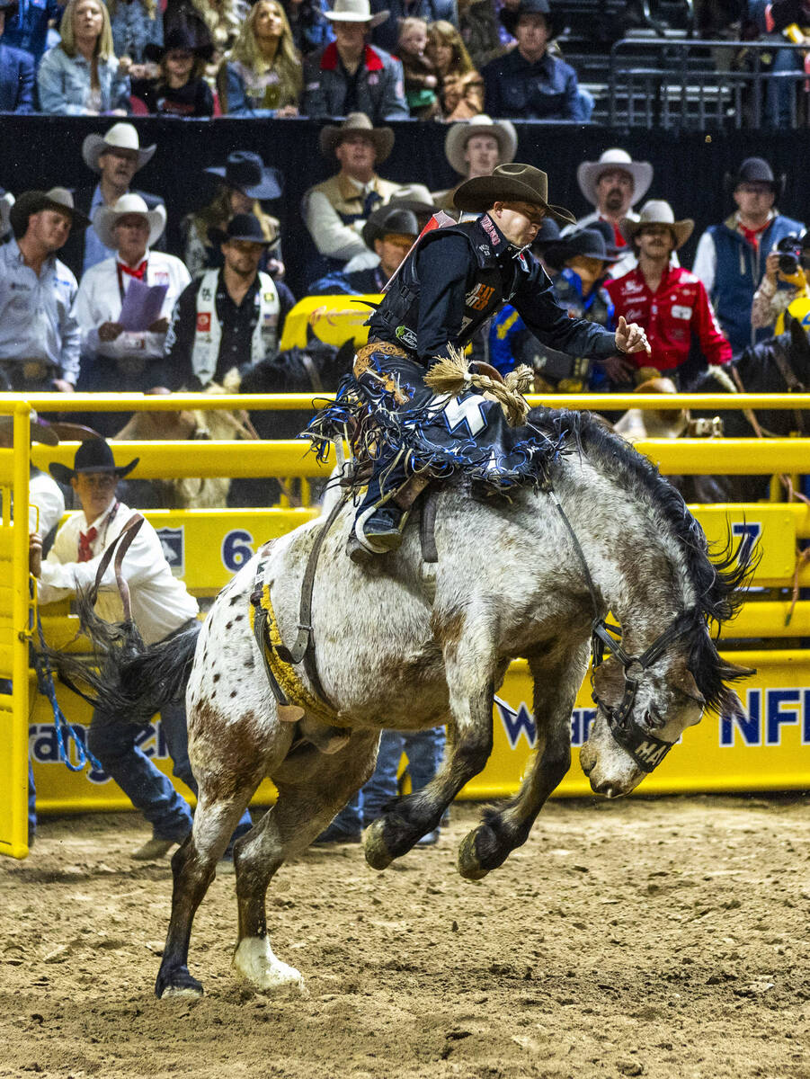 Zeke Thurston rides Falkland Playboy in Saddle Bronc Riding during the 9th go-round of National ...