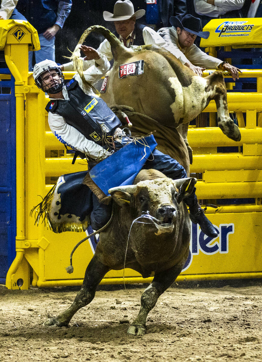 Qynn Andersen rides Mr. Gold to a winning score in Bull Riding during the 9th go-round of Natio ...