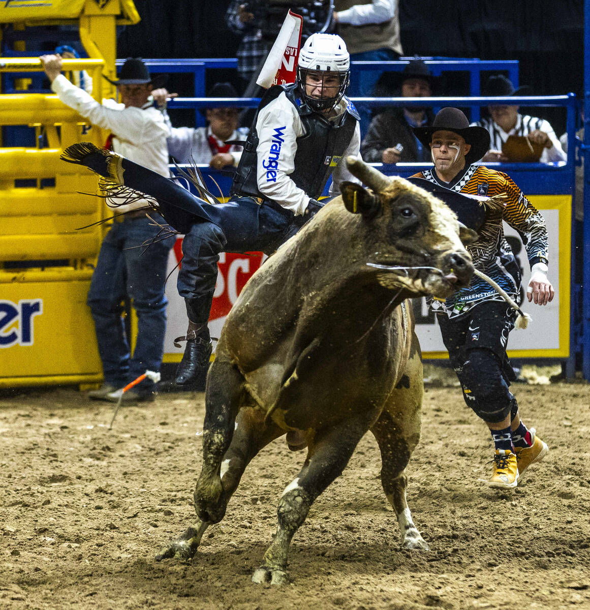 Qynn Andersen rides Mr. Gold to a winning score in Bull Riding during the 9th go-round of Natio ...