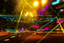 A band opens the night's events during the 9th go-round of National Finals Rodeo at the Th ...