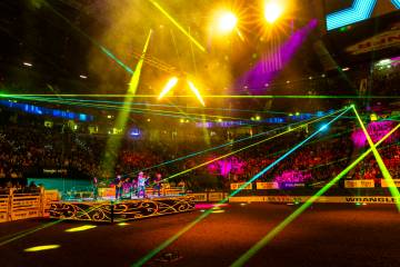 A band opens the night's events during the 9th go-round of National Finals Rodeo at the Th ...