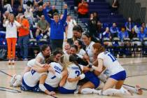 The Bishop Gorman team celebrates the Gaels’ win over Coronado in the 5A girls volleybal ...