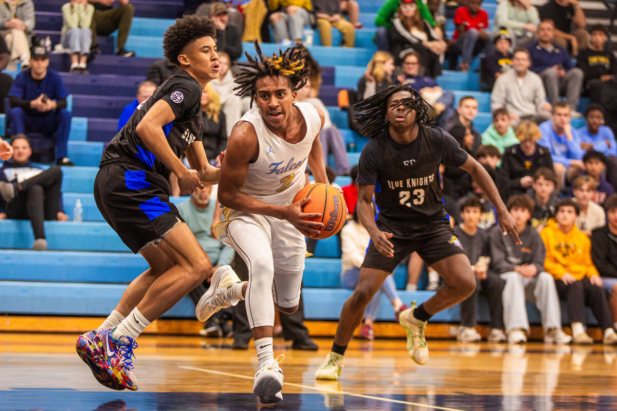 Foothill guard Aaron Garbutt (2) looks to pass the ball during a basketball game between Democr ...