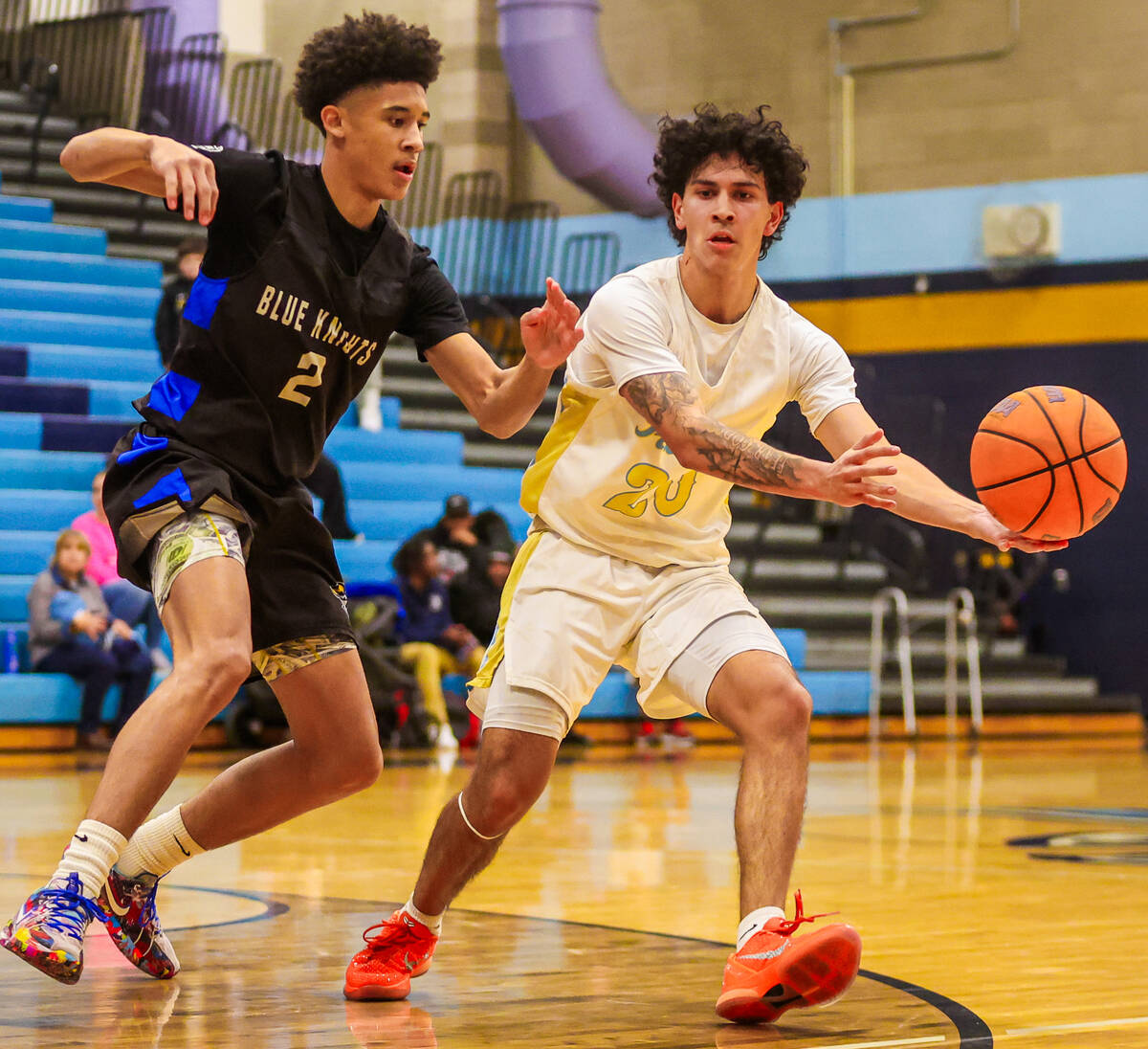 Foothill guard Mudd Comtois (20) passes the ball during a basketball game between Democracy Pre ...