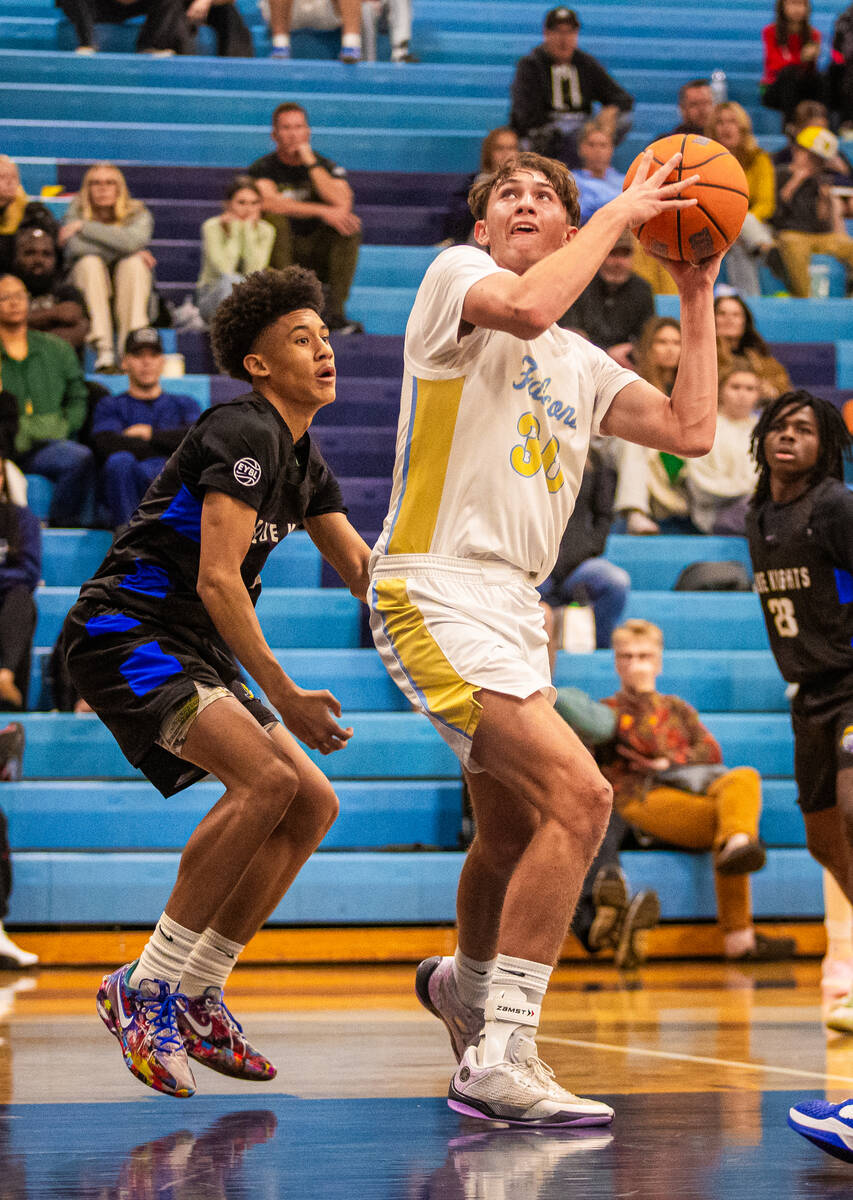 Foothill forward Packer Kelley (30) eyes the basket during a basketball game between Democracy ...